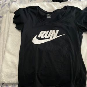 Nike short sleeve Tee for women. size: small color black w/ white letters.